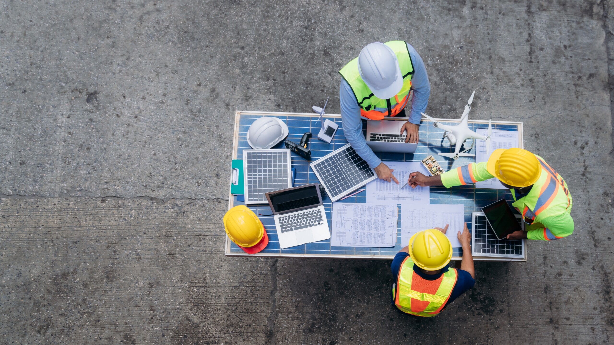 Team,Worker,Checking,Inventory,About,Solar,Cell,And,Turbine,At